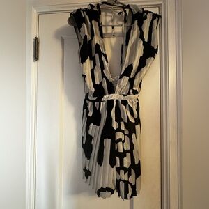 Pretty Little Things Deep “V” Black and White Romper